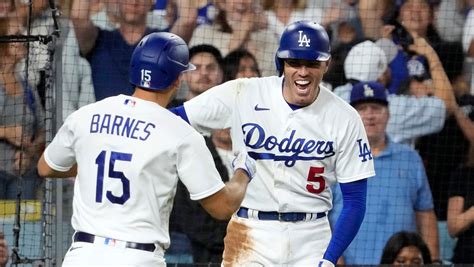 Barnes homers for first time in nearly a year, Dodgers beat Brewers 1-0 for 11th straight victory